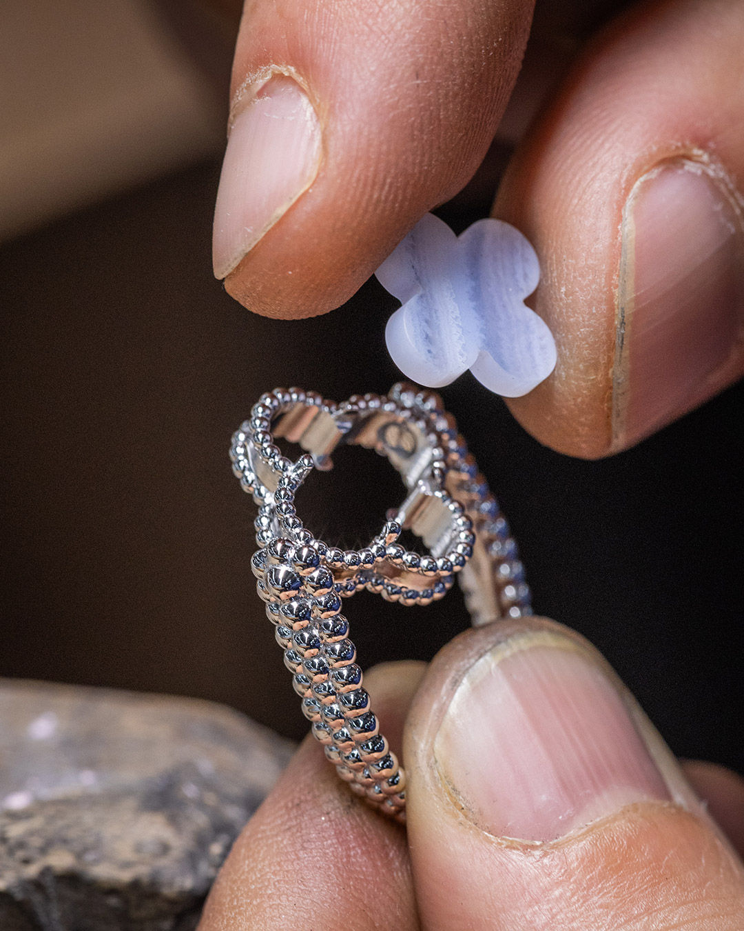Chalcedony or guilloché white gold? Both!⁣
⁣
Enhanced by the beaded contour, the gleaming faces of the new Vintage Alhambra reversible ring will grace your finger with intense reflections.⁣
From the positioning of the shimmering motifs to the final polishing, the transformable piece comes to life in the craftsmen's hands.⁣
⁣
#VCAAlhambra #VanCleefArpels