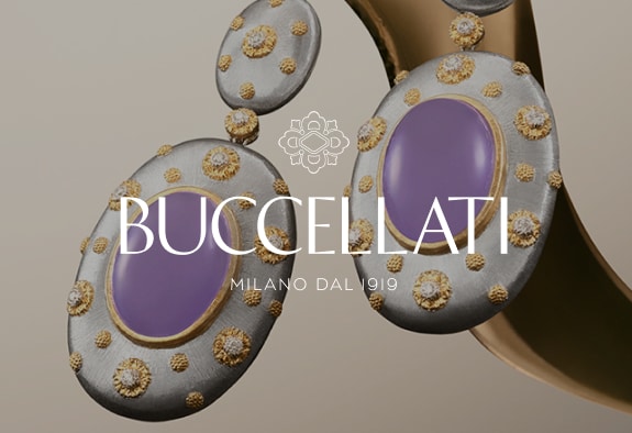 Buccellati logo with earrings in the background