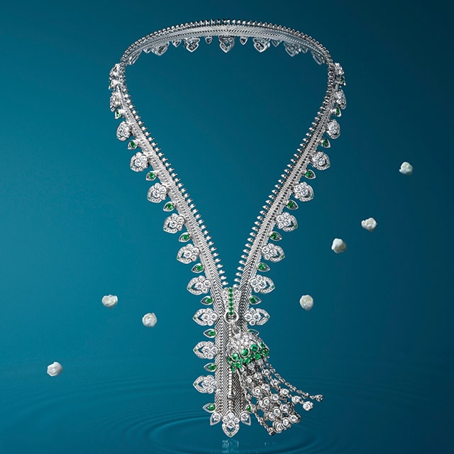 Zip necklace collection with Diamonds on a blue background